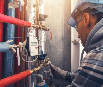An expert checks the efficiency of a barometric damper.